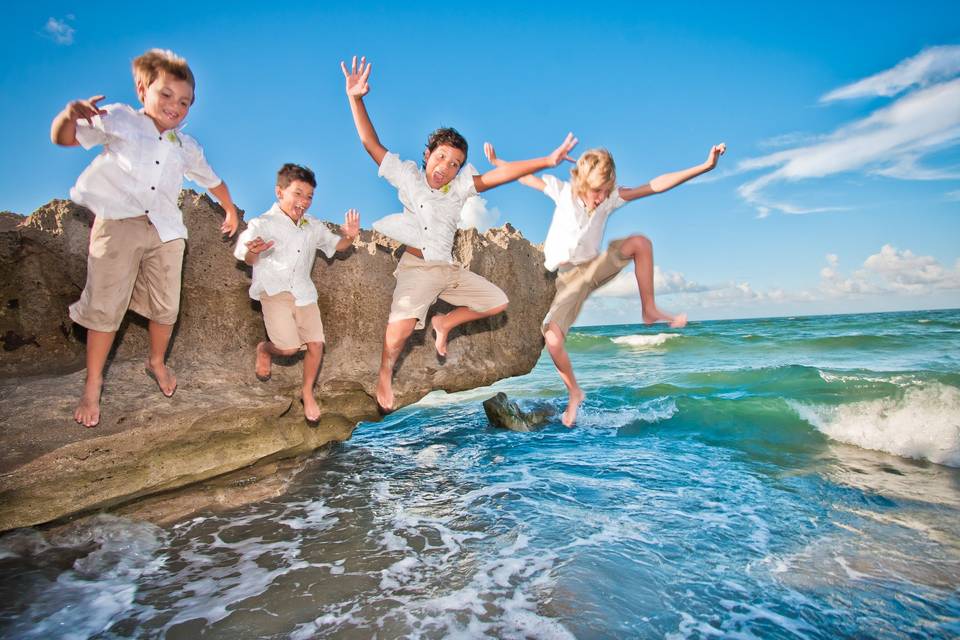 Beach Wedding clothing for Boys and Girls. Matching Hawaiian and White on White prints. Cost effective and cool clothing for the entire wedding party. Guests can find nice clothing to wear to a beach or destination wedding. Tropaholic.com your Tropical Lifestyle Clothing Headquarters.