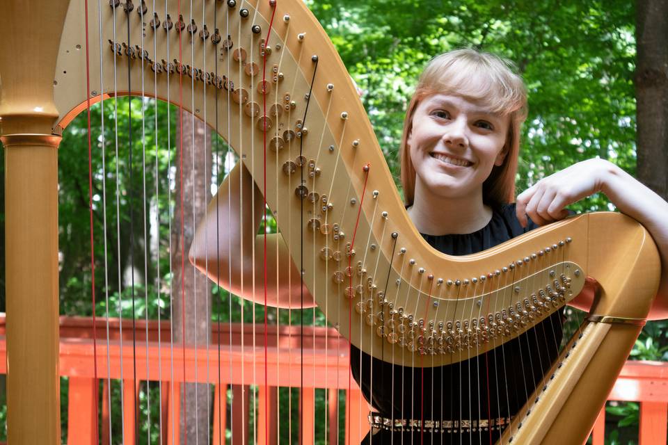 Abigail with harp outside