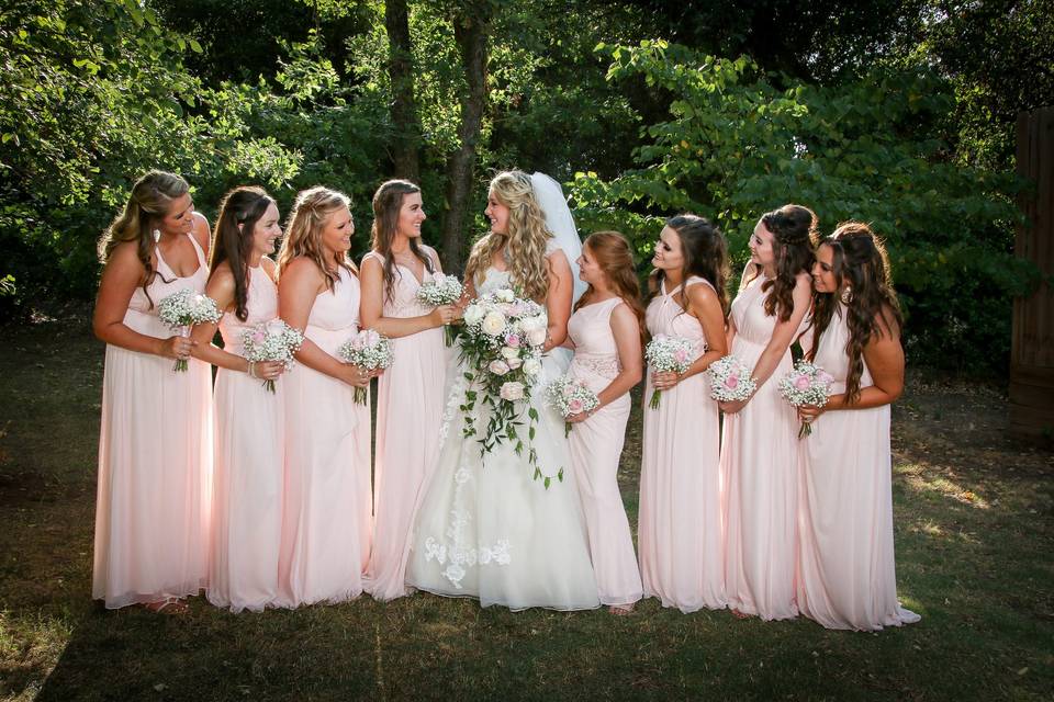 Bride and maids in garden