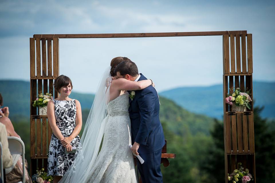 Couple with the officiant