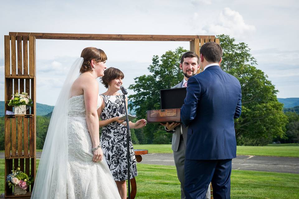 Couple with the officiant