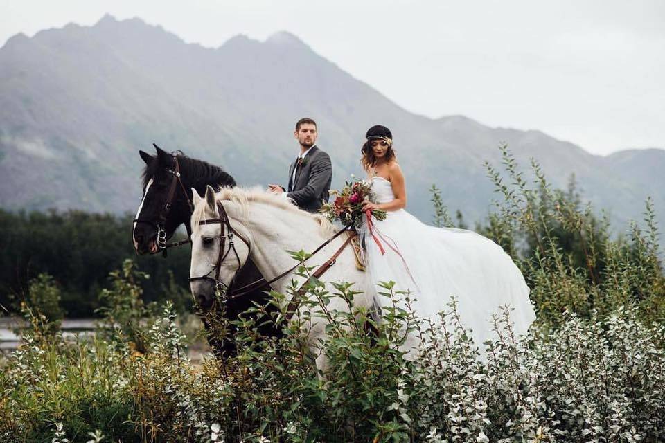 Newlyweds on horses