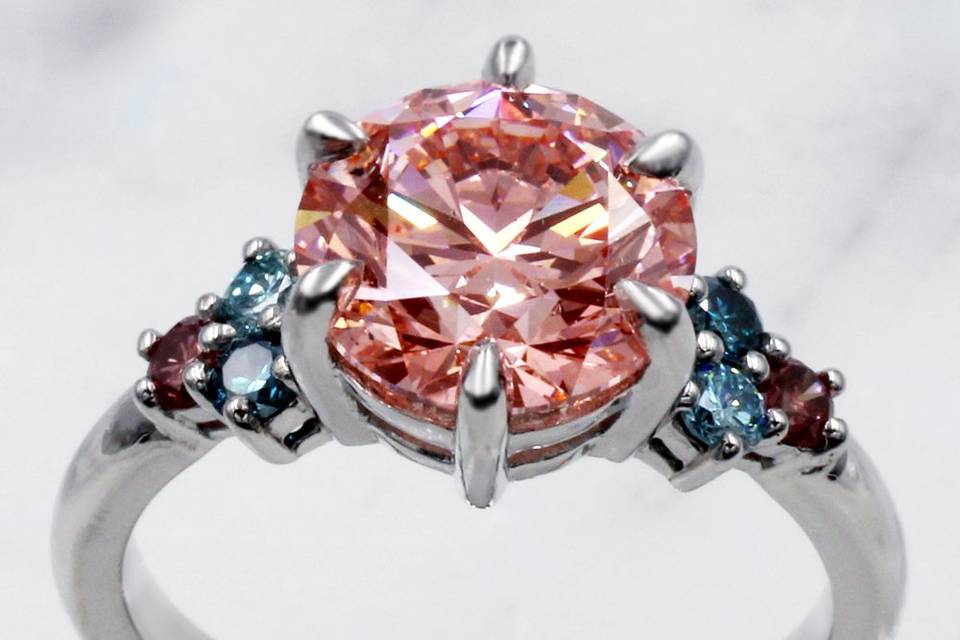 Peach Sapphire in custom ring