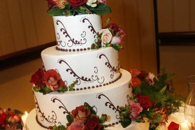 4-tier wedding cake with chocolate detailing