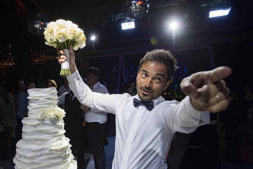 Groom, cake & the bouquet