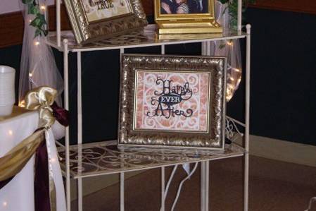 Phot stand for the bride and groom to display their personal photos.
