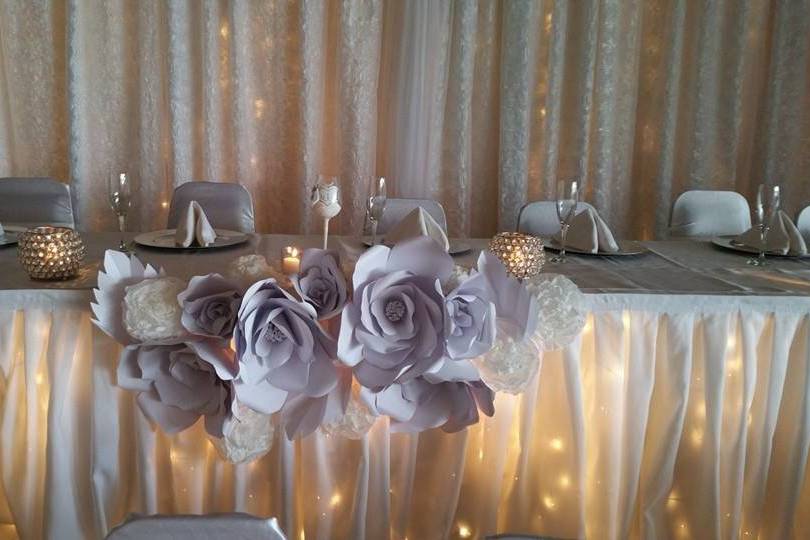 We created some large paper flowers to adorn the head table.
