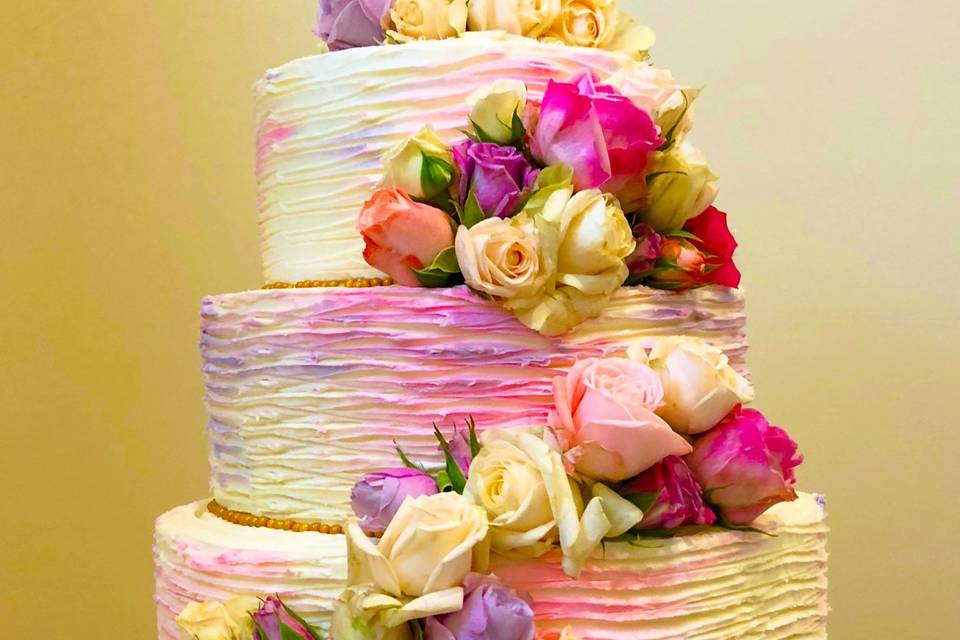 Cascading flowers on cake