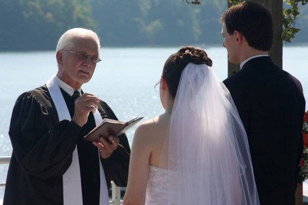 Priest and couple