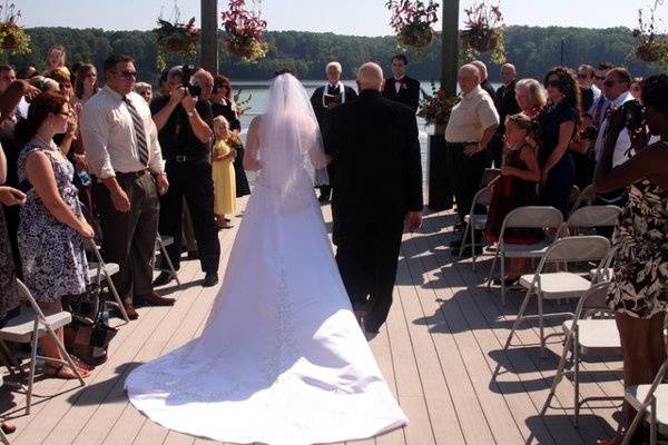 Bride and father walking
