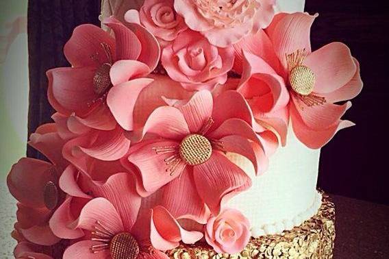 Iced cake with pink flowers