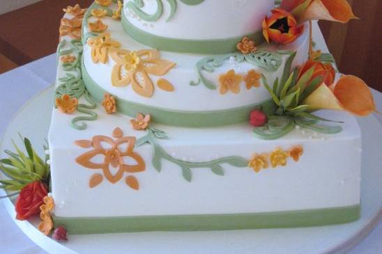 buttercream icing with fondant vine and floer overlay