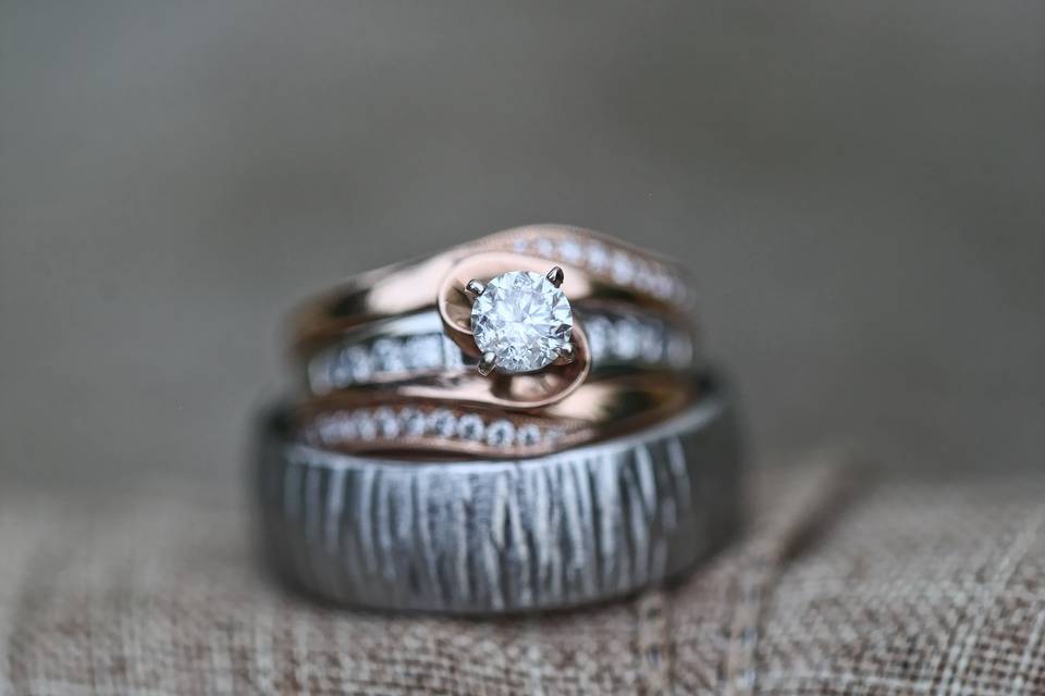 Wedding rings on burlap accent