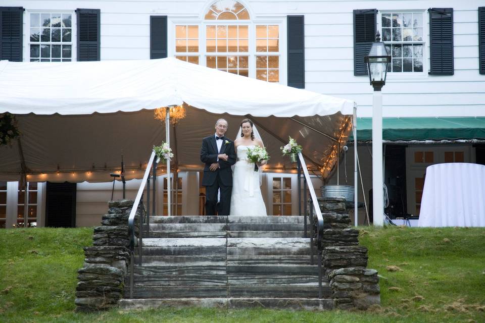 Man and woman posing outside