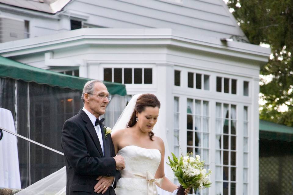 Bride walking down stairs