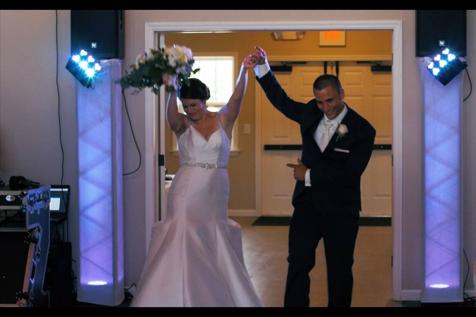 Newlyweds Kelsea and Brett Reed making a memorable entrance to the reception