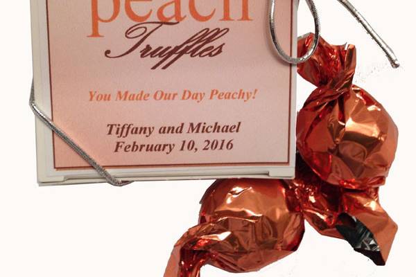 Our decadent chocolate truffles with peach center make a great personalized wedding favor for your special day.