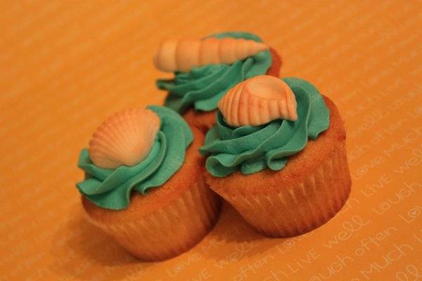 Fondant sea shell toppers for a beach wedding