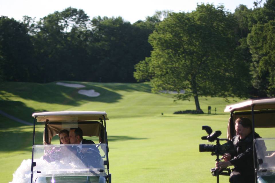 Filming from a golf cart.