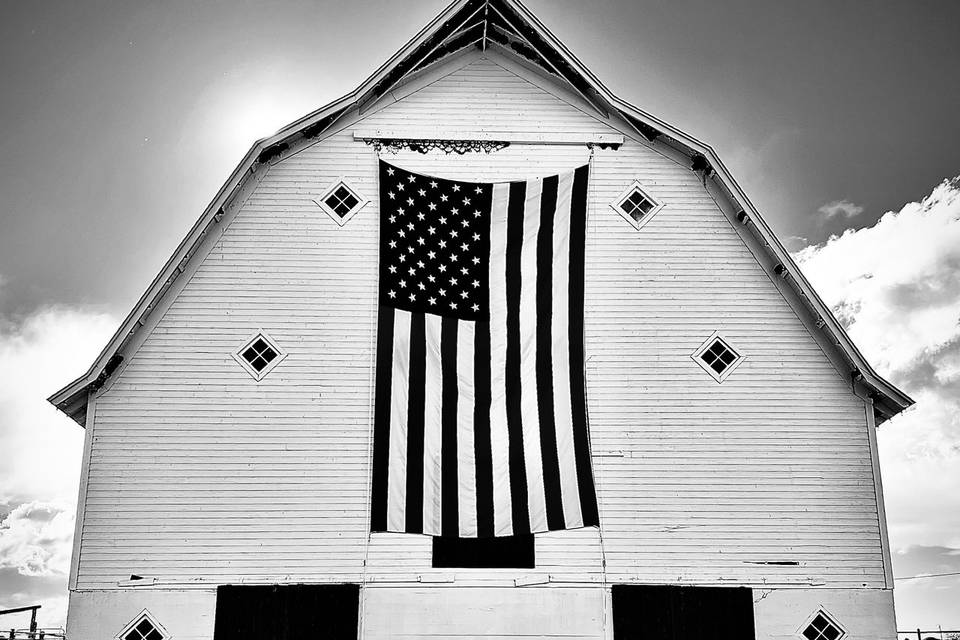 Canary Barn with American Flag