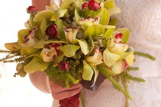 Green Cymbidium Orchids with touches of burgundy bouquet