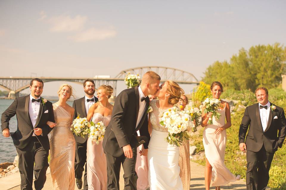 Newlyweds, bridesmaids, and groomsmen