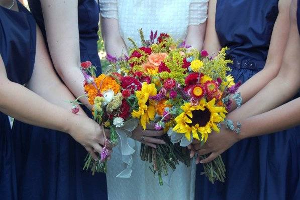 Bridesmaids and bride with flowers