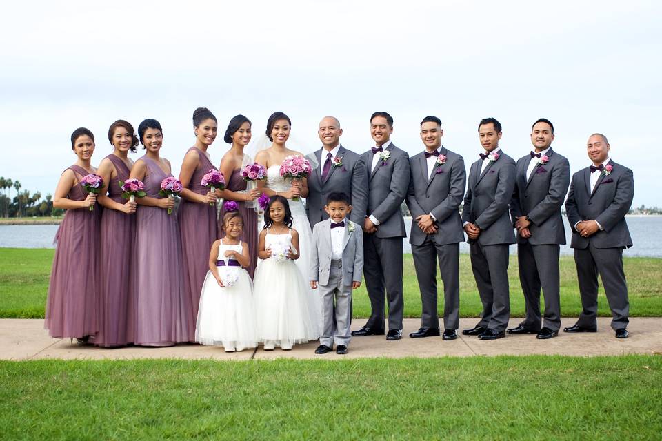 The newlyweds with the wedding attendants