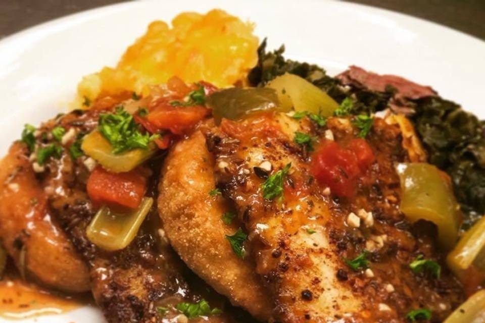 Blackened fish and fried grits