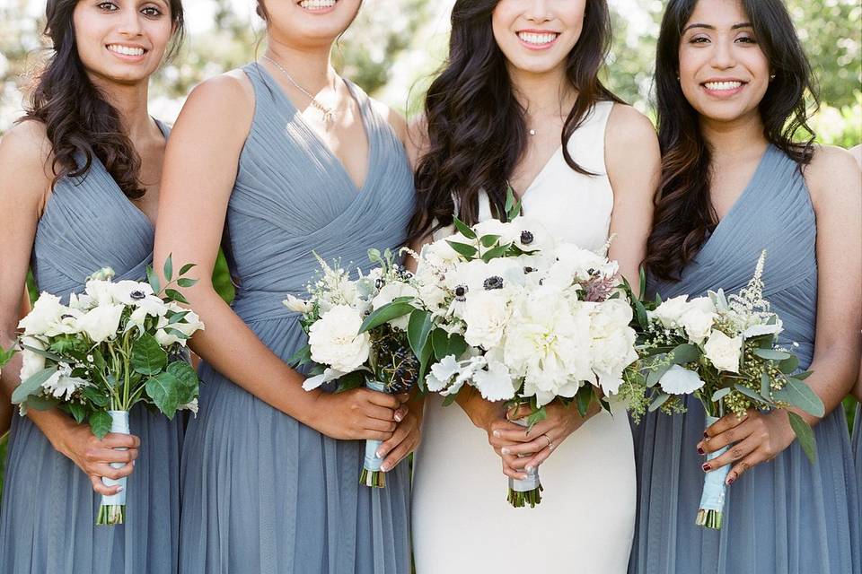 Blue dresses | photo credit: Kurt Boomerfloral: Tesoro