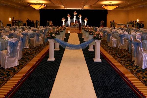 Chair Covers and Sashes, Stage Decoration, Table Overlays, Centerpieces with fresh flowers
Location: Westfield Marriot