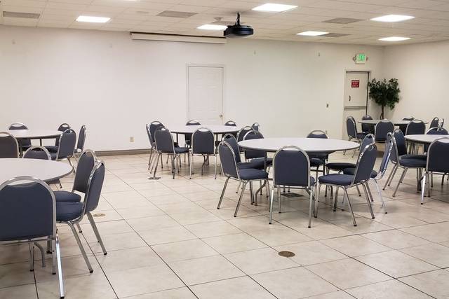 Seating for 200 with tables and chairs.