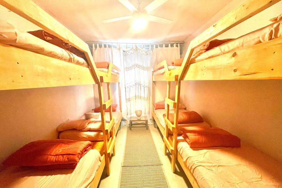 Bunk room with 8 single beds