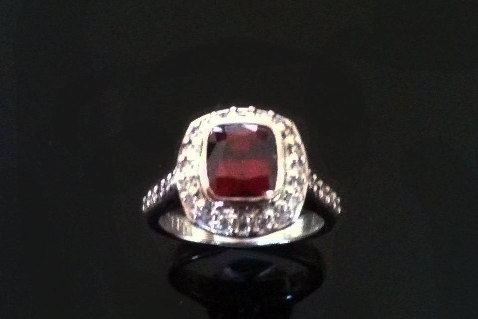 Custom design ruby and diamond engagement ring