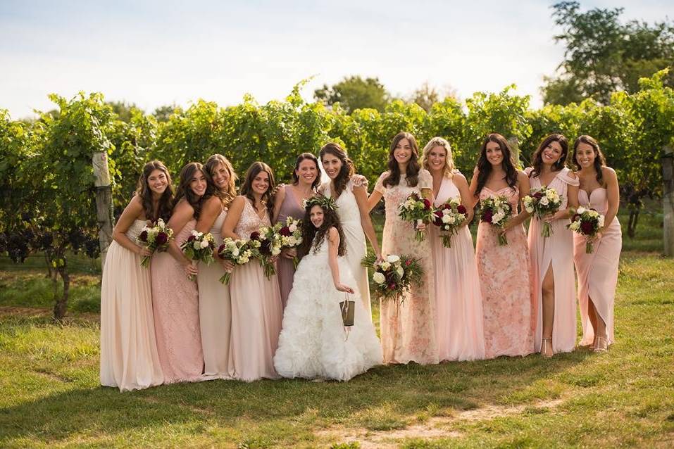 Bride with bridesmaids and flower girl