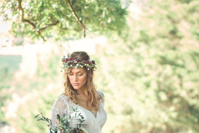 Photos at our wooded overlook are amazing! This photo taken by Memories by Renee Hardin of this boho bride are amazing! Florals by Monique's Flower Barn and gown from The Gilded Gown.