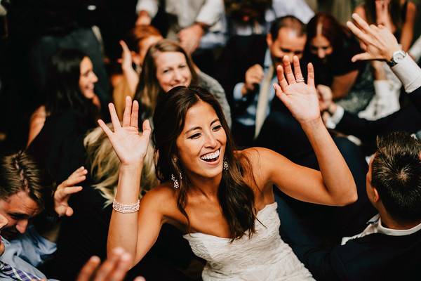 Bride hands up in the air