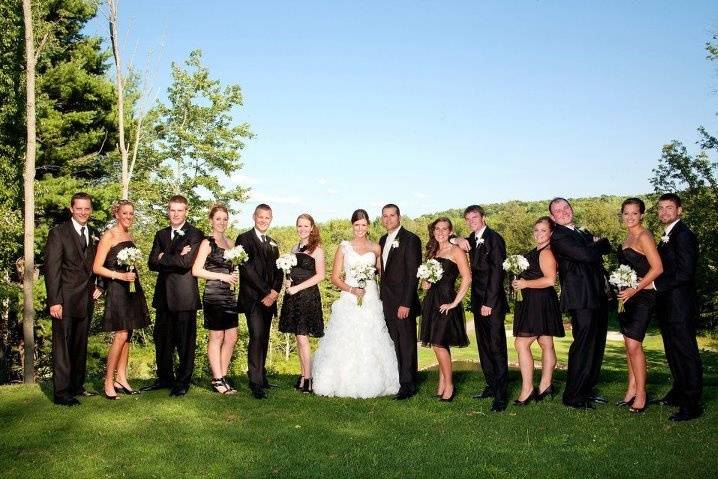 The couple with the bridesmaids and groomsmen