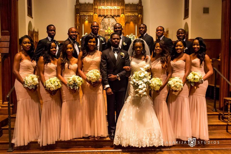 The couple with the bridesmaids and groomsmen