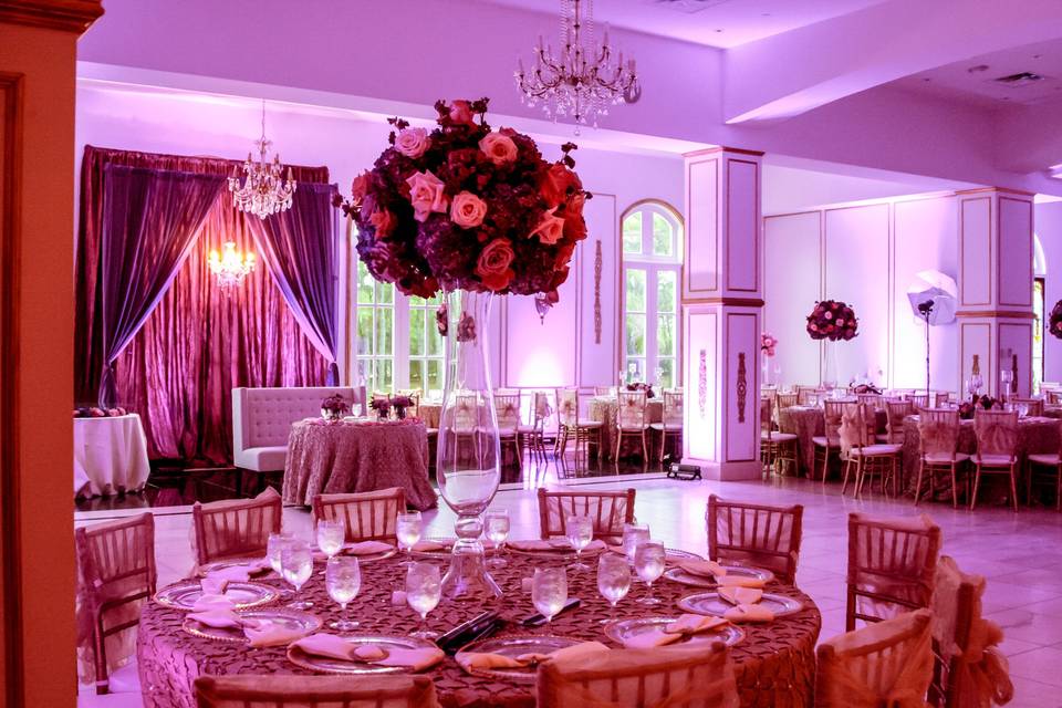 Round table setup with tall centerpiece
