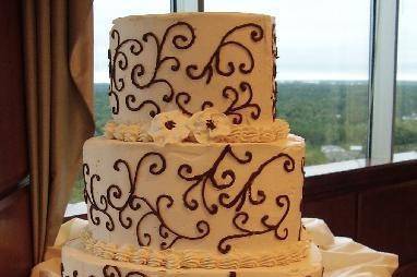 Wedding cake with purple piping