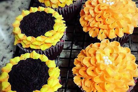 Sunflower and mum cupcakes, chocolate cake with buttercream