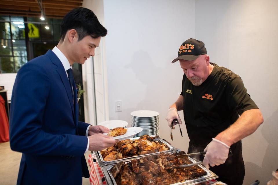 Groom enjoying Phi's BBQ