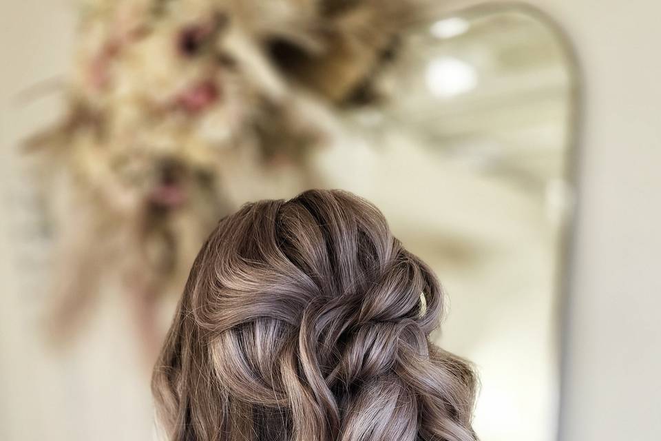 Textured twisted half up