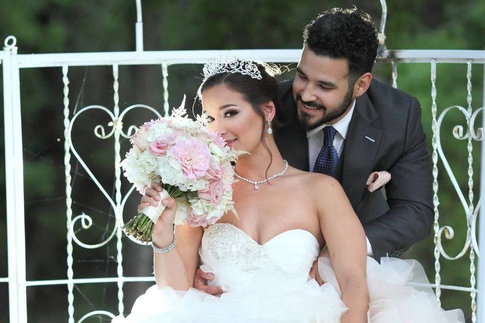 Bride leaning on her groom