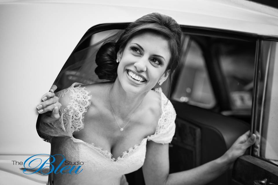 Bride stepping out of the car