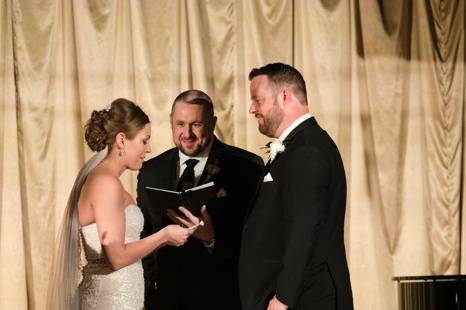 Couple reading vows