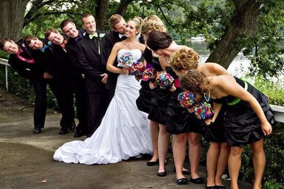 The couple with the bridesmaids and groomsmen