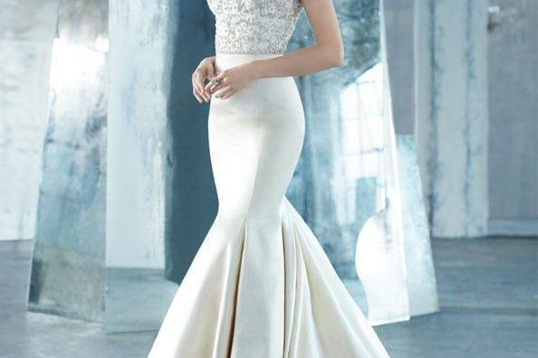 Style LZ3314 Antique silk faced satin trumpet bridal gown, sheer jewel encrusted V-neck bodice, crystal trim at natural waist, chapel train.