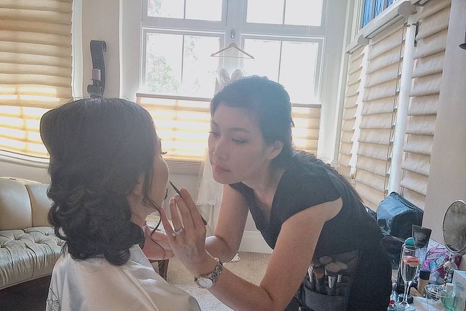 Bride and her makeup artist